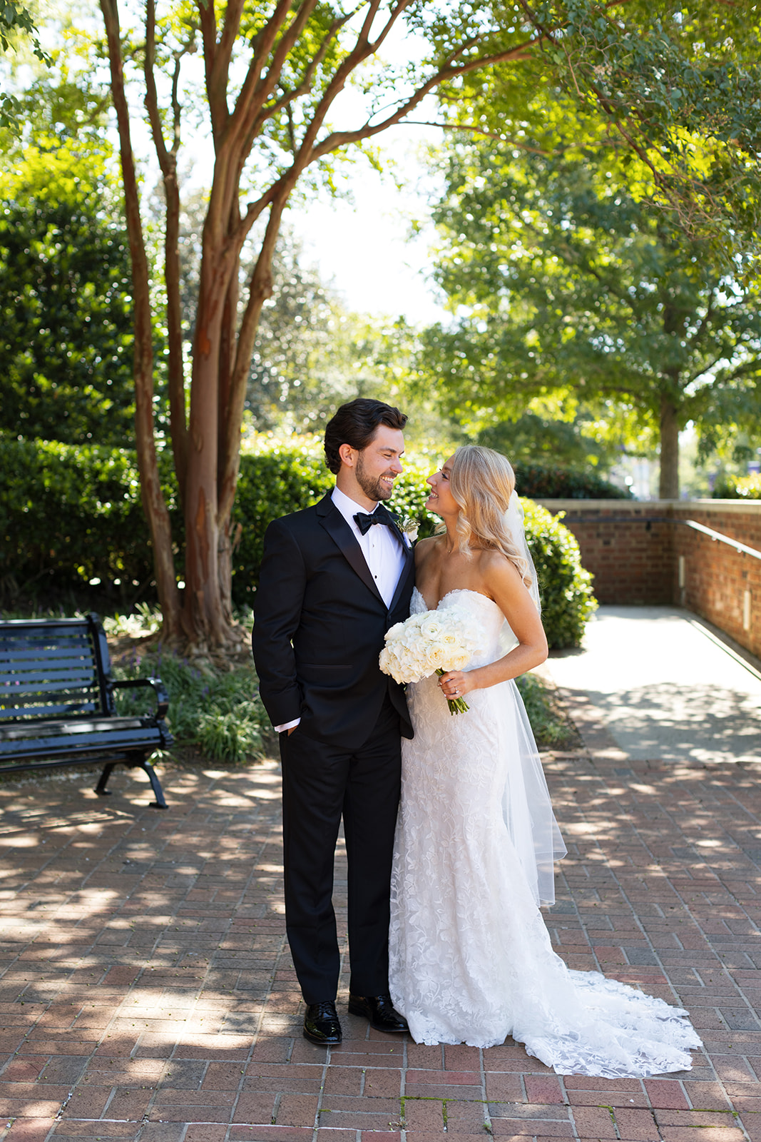 true to color wedding photo of a bride and groom locking eyes