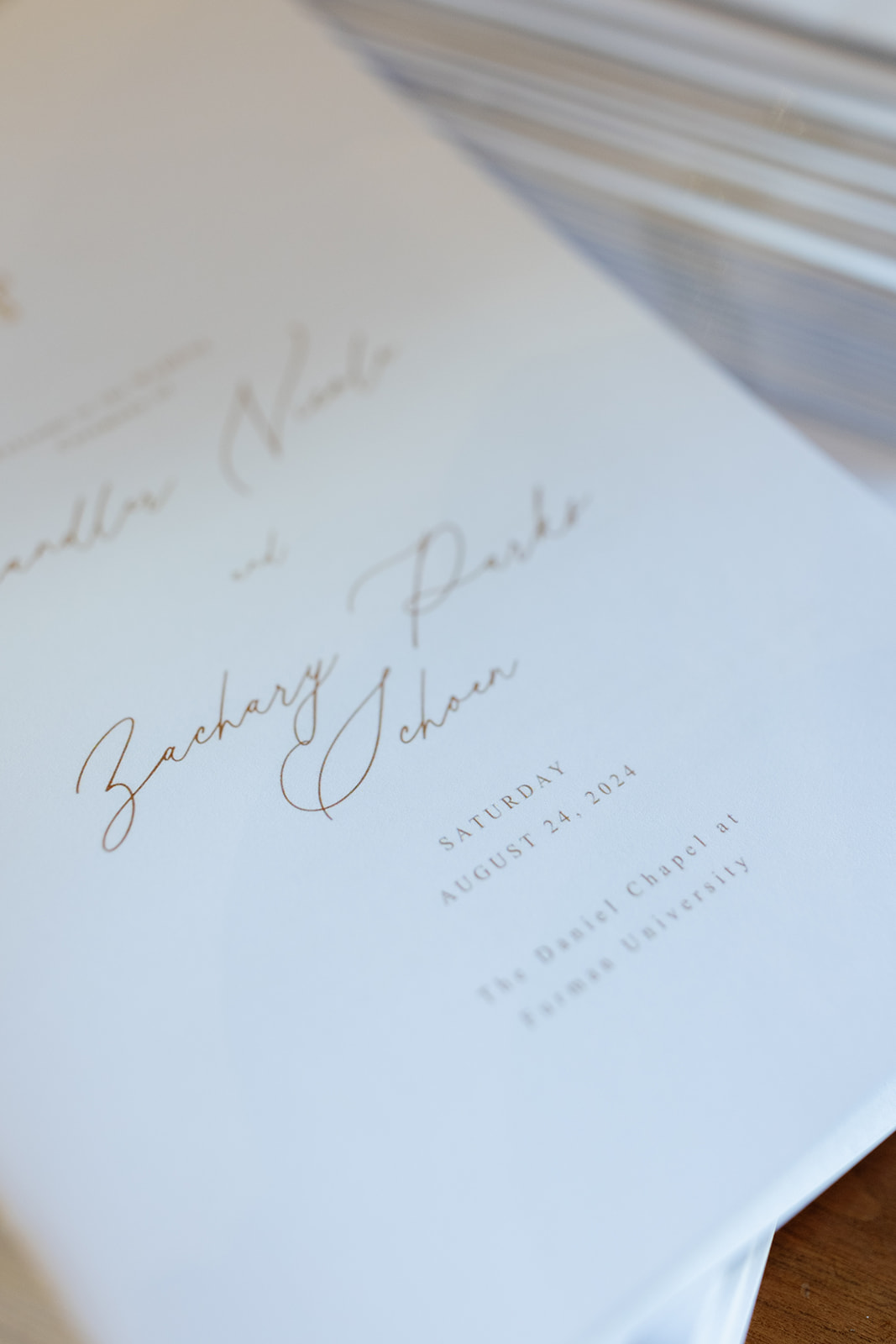 close up detail shot of the couples elegant wedding invitation as part of their wedding weekend timeline
