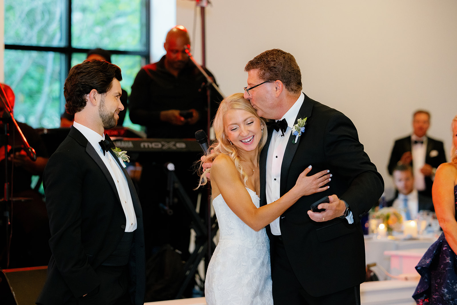 Father of the bride celebrating the joyful wedding weekend.