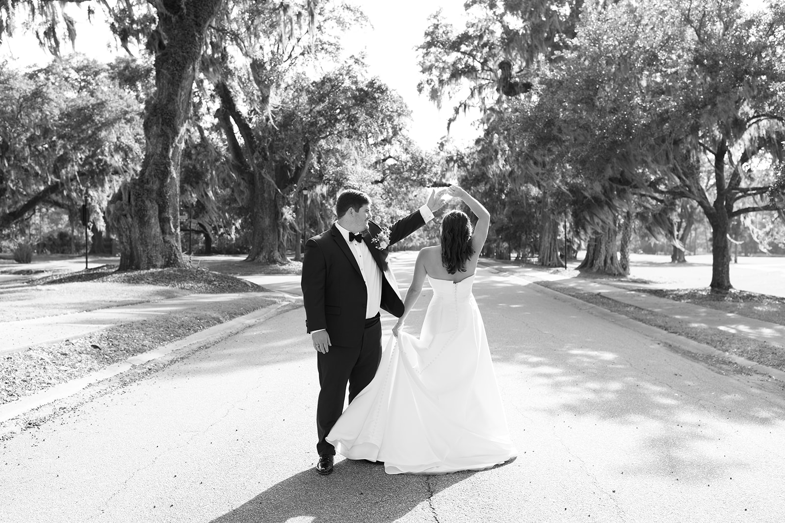 Brooks twirls Mills in the middle of a tree-lined Charleston street in a joyful moment.