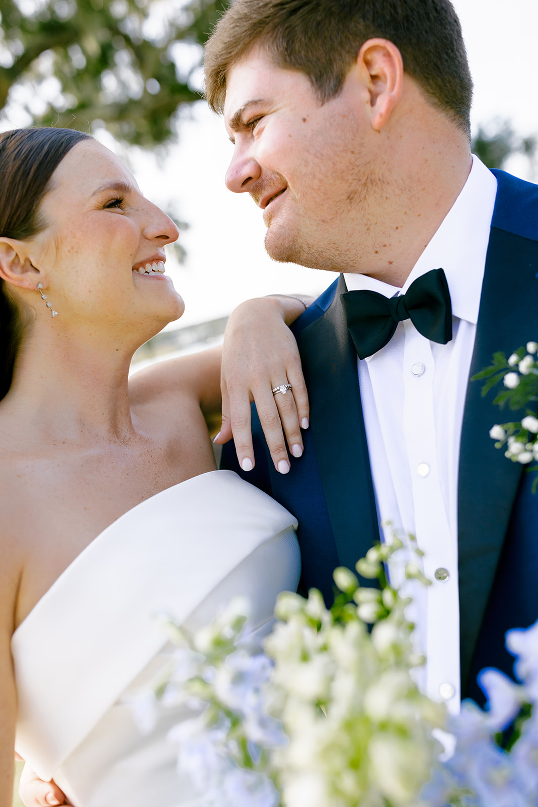 bride and groom smiling at each other for their Charleston Wedding 