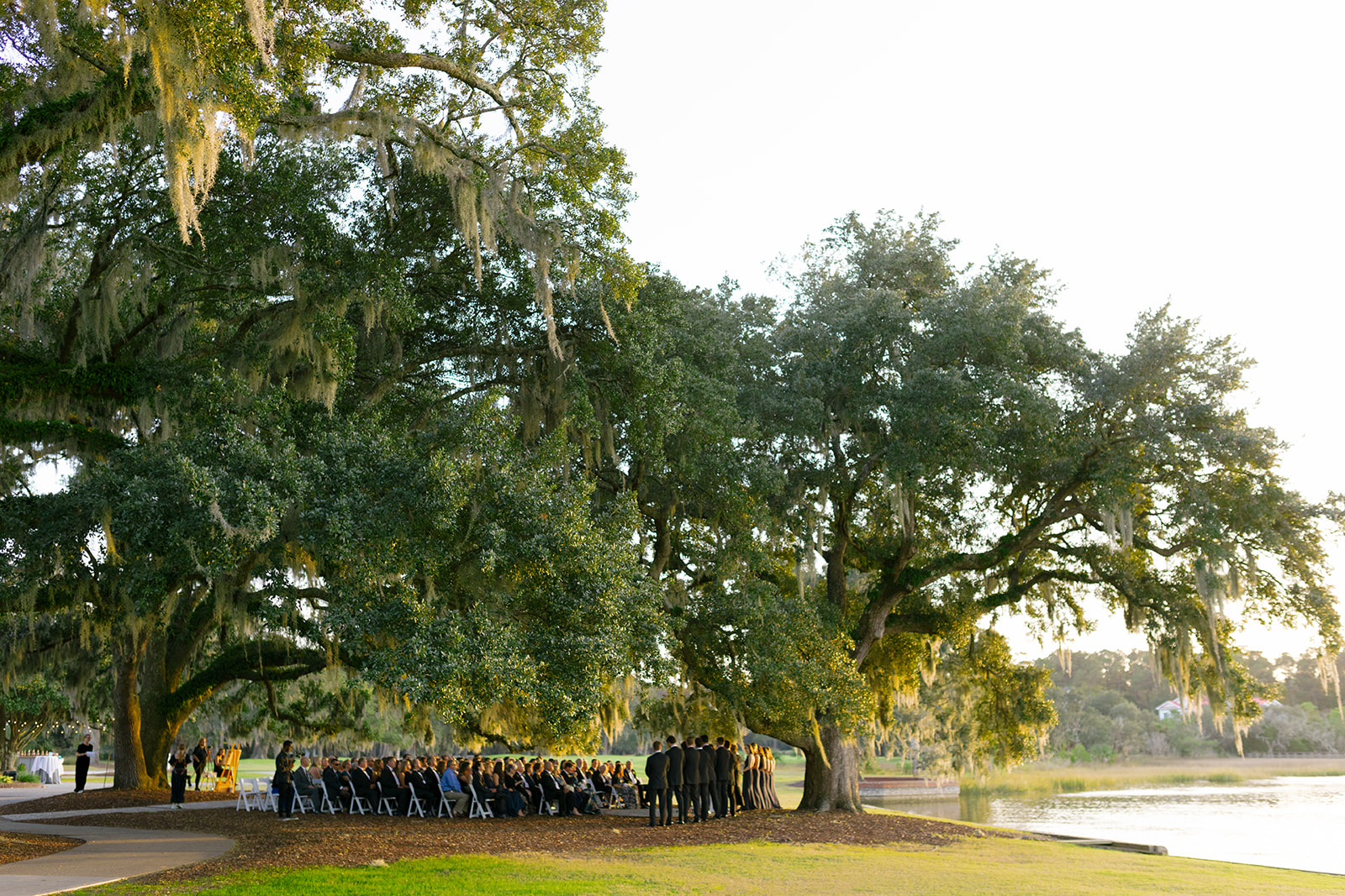 the ceremony space under the trees from afar