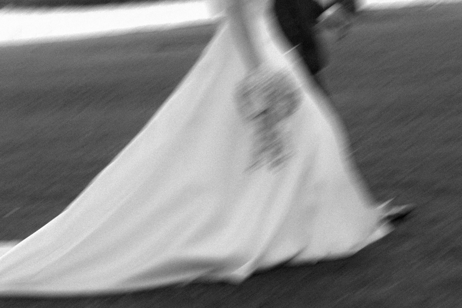 blurry photo of the bridal couple walking 