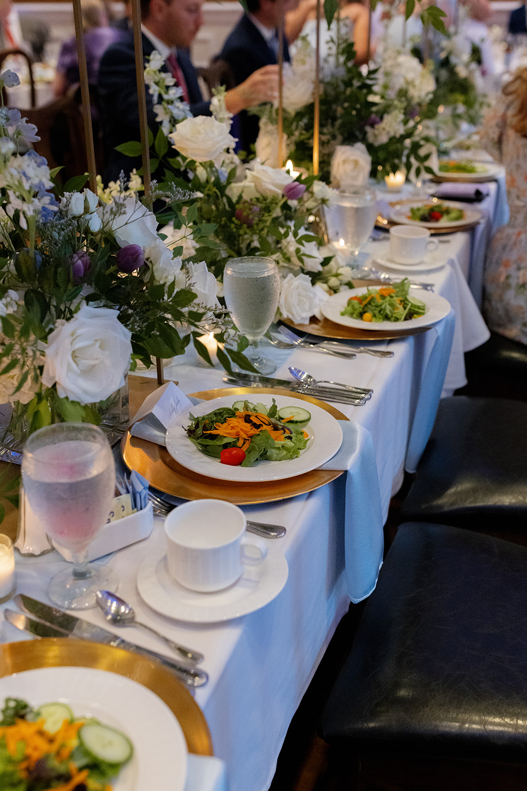the reception tables set with food taken by a Greenville wedding photographer