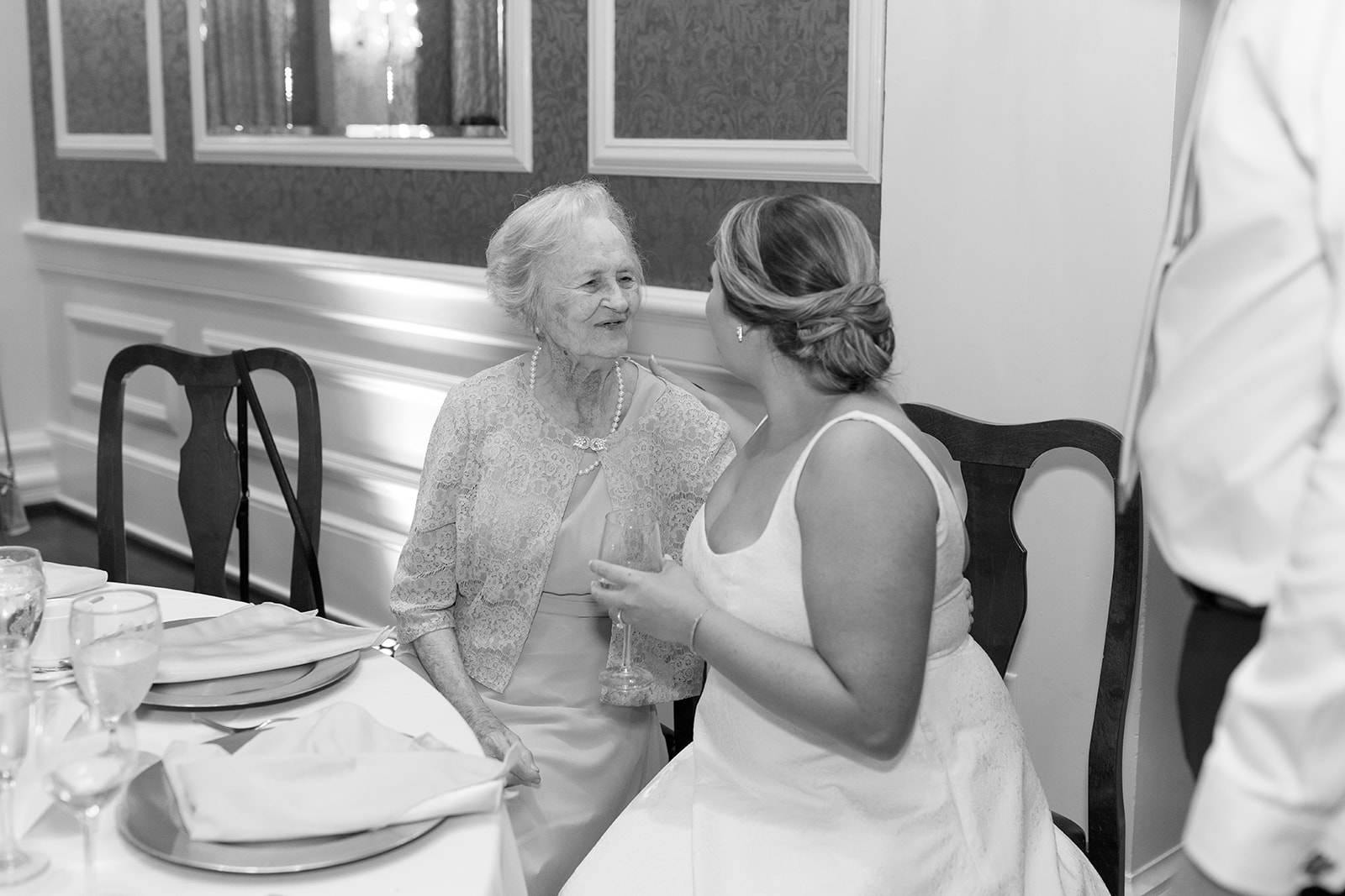bride shares special moment with her grandmother taken by a Greenville wedding photographer