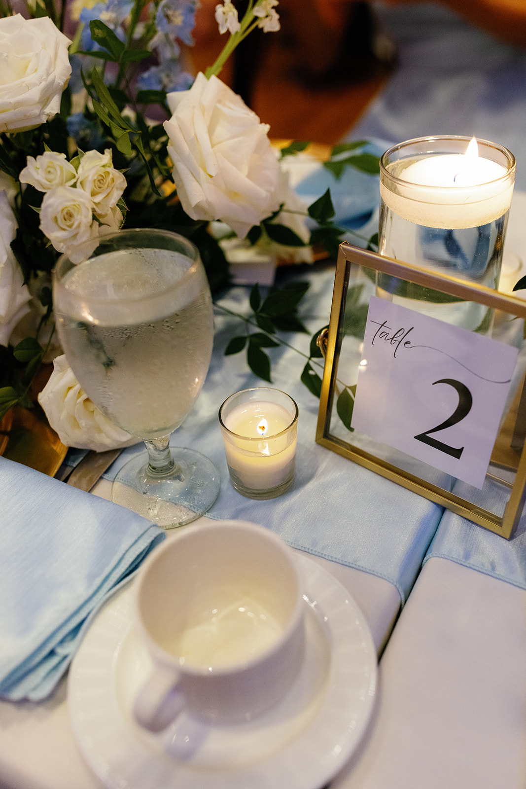 reception tables with candles and numbers 