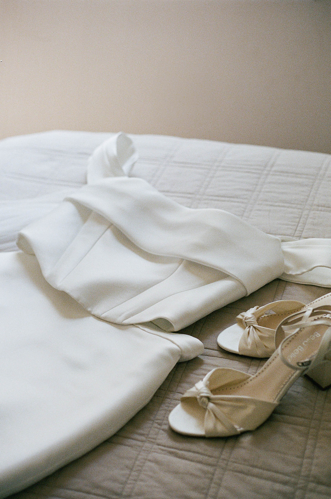 bride's stunning wedding gown and shoes captured by a South Carolina wedding photographer