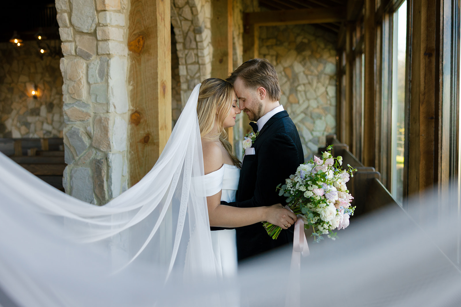stunning newlyweds inside Glassy Chapel taken by South Carolina wedding photographer