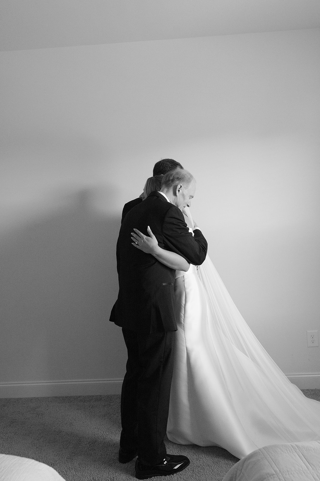 bride hugs her father
