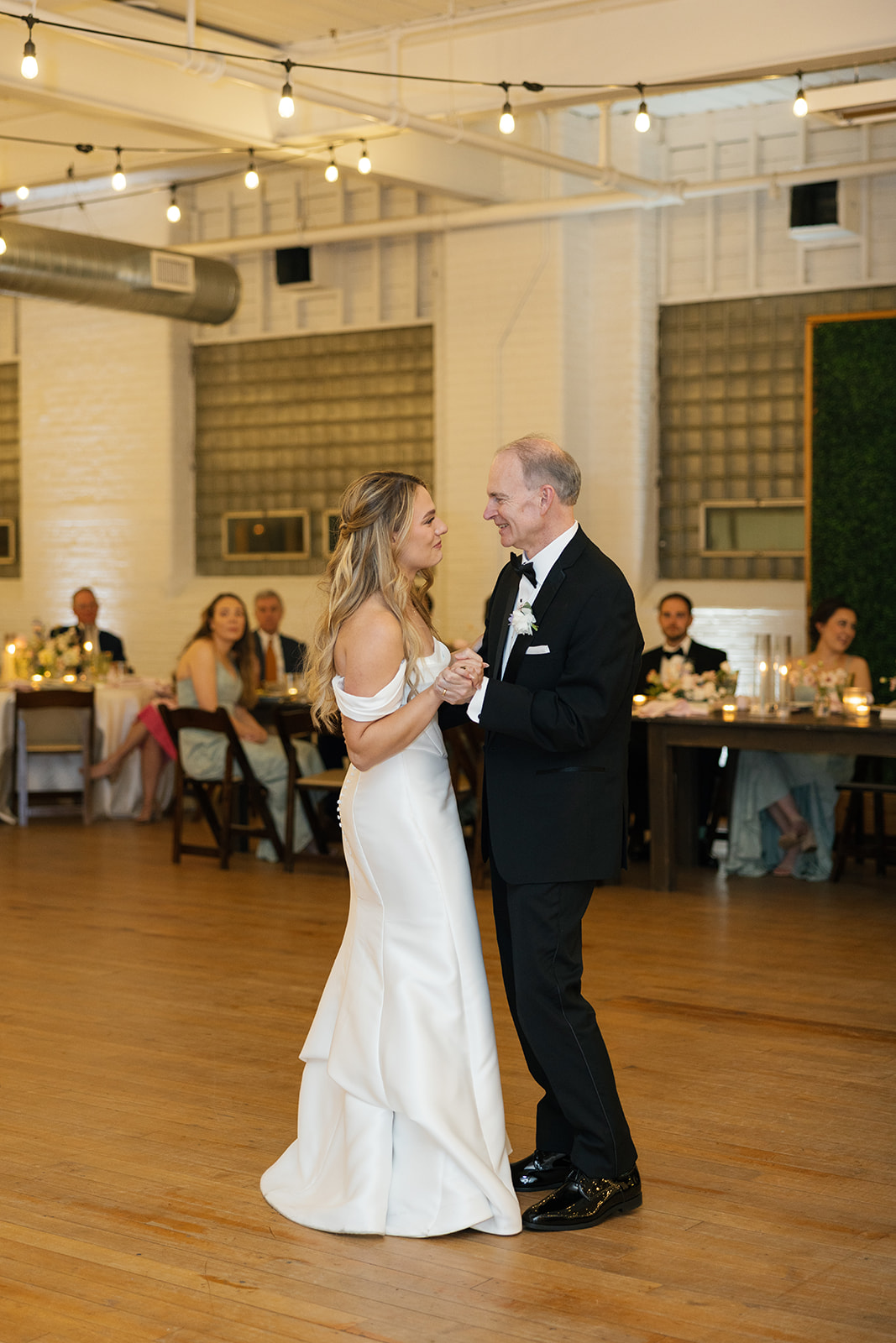 bride sharing a dance with her father