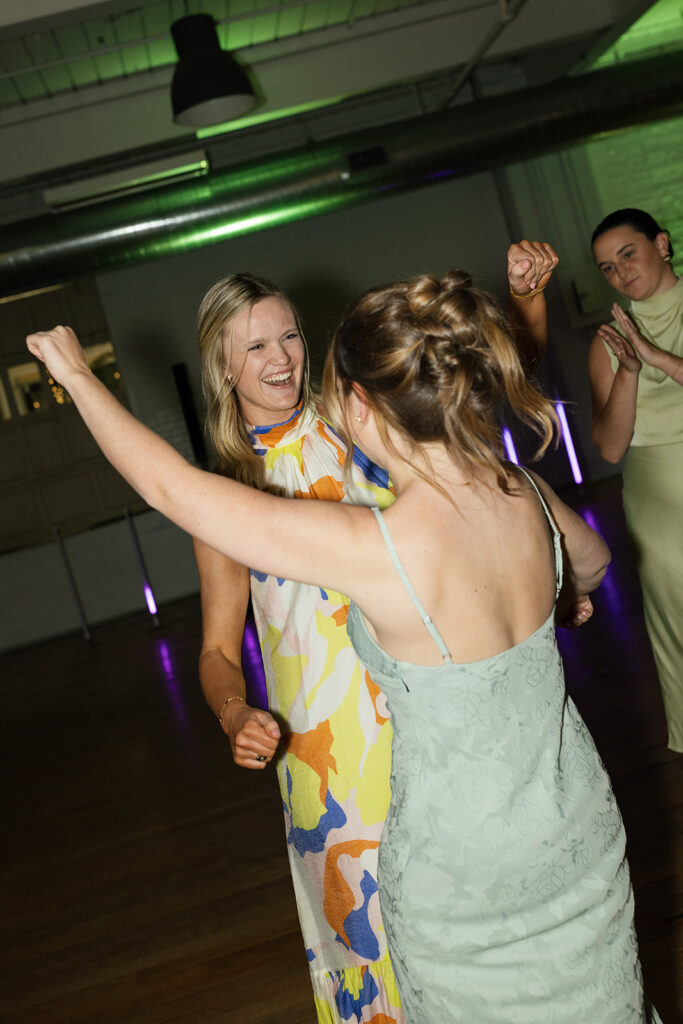 bridesmaid dancing at the wedding reception