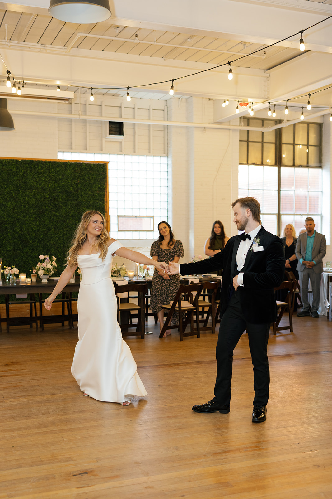 bride and groom sharing a first dance at their wedding reception