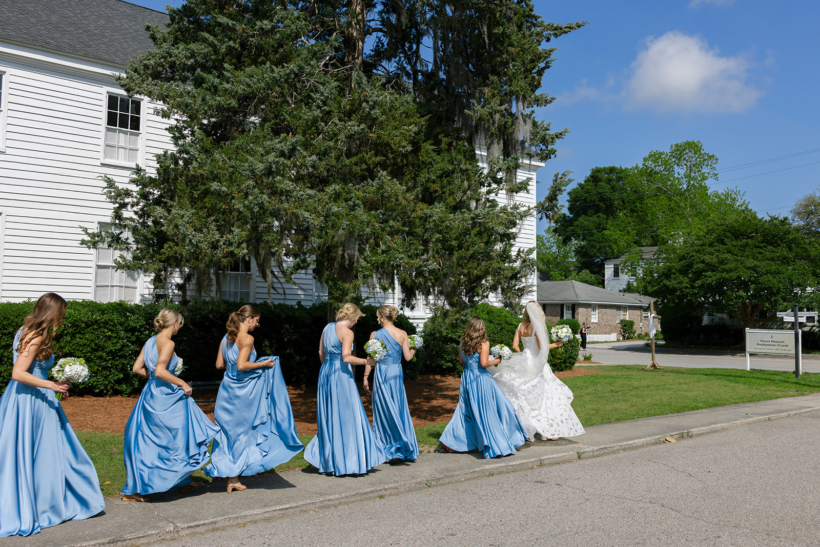 bridesmaids and bride walking to Mount Pleasant Presbyterian