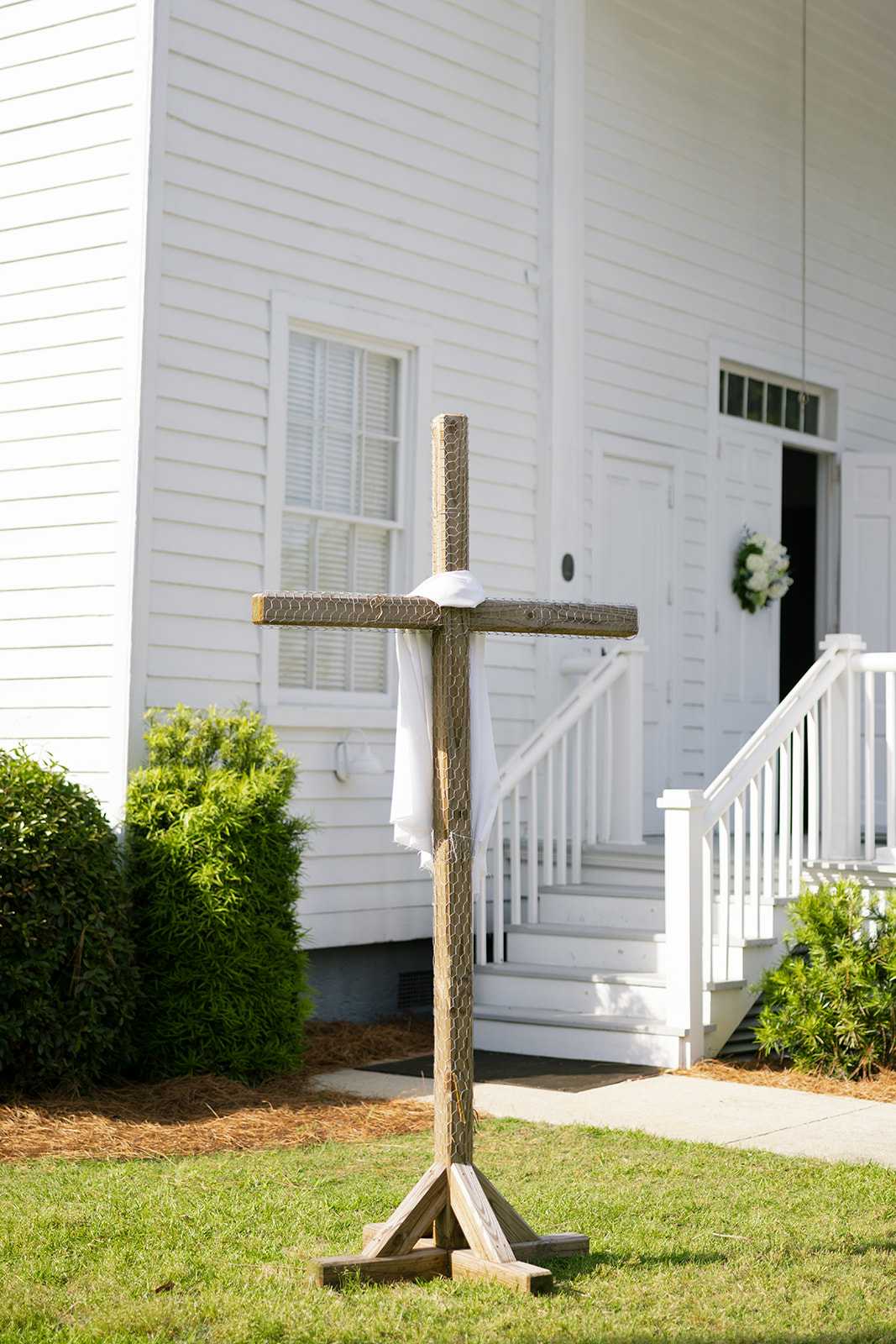 large wooden cross in front of Mount Pleasant Presbyterian