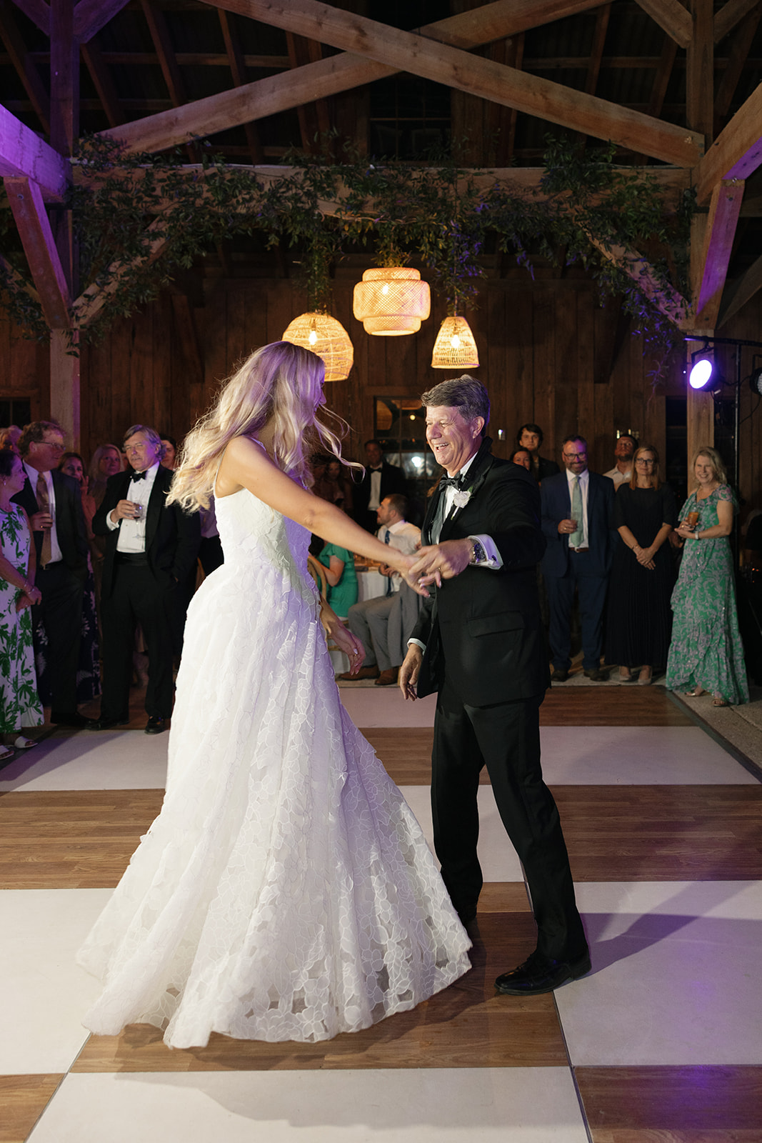 bride and her father dance in the Cotton Dock