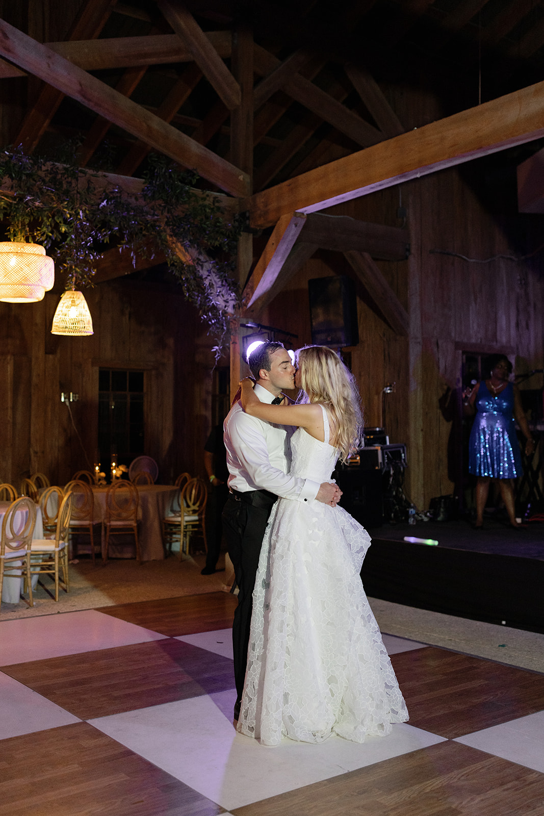Bride and groom share a kiss during their last dance at Boone Hall Plantation