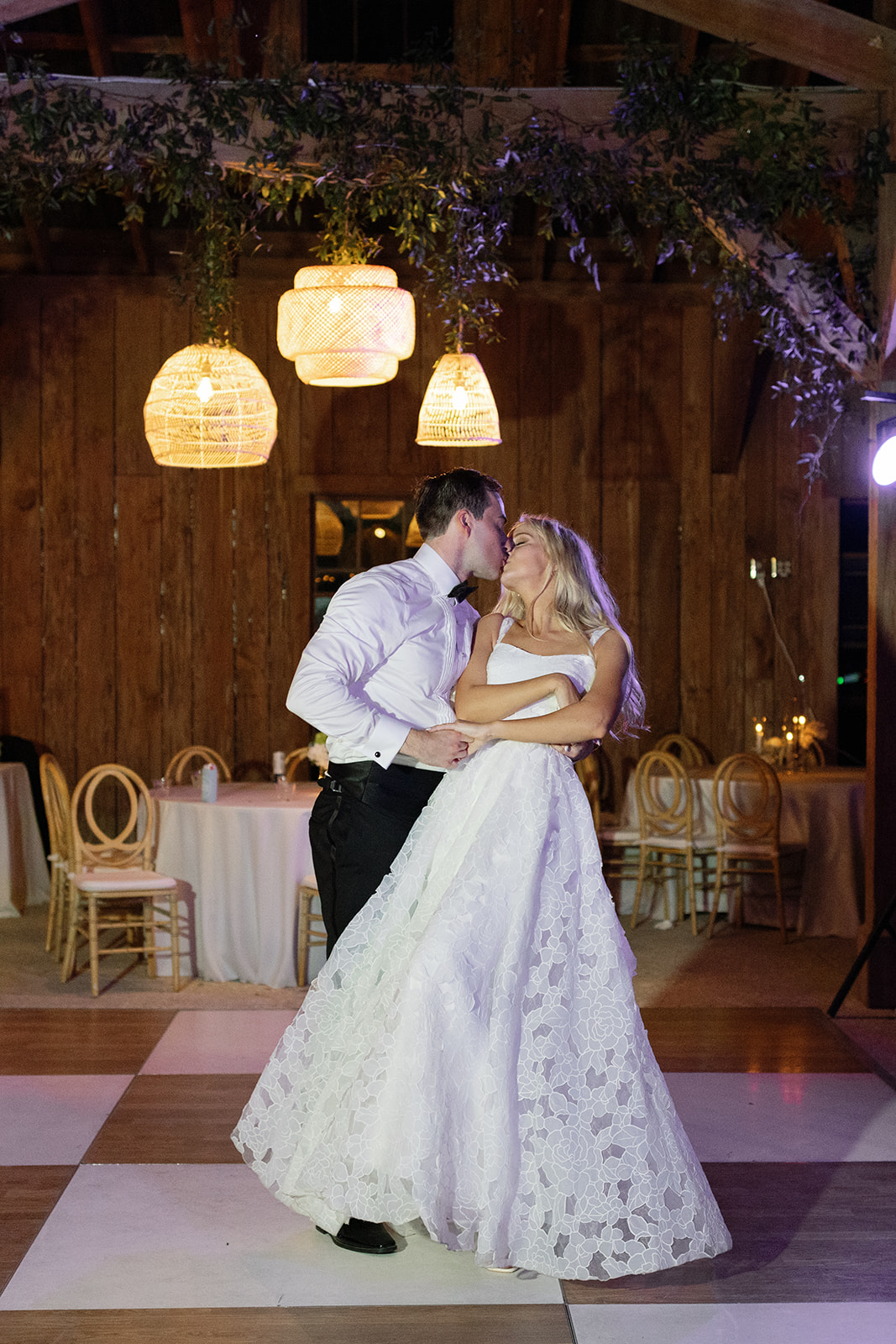 Bride and groom share a kiss during their last dance at Boone Hall Plantation wedding