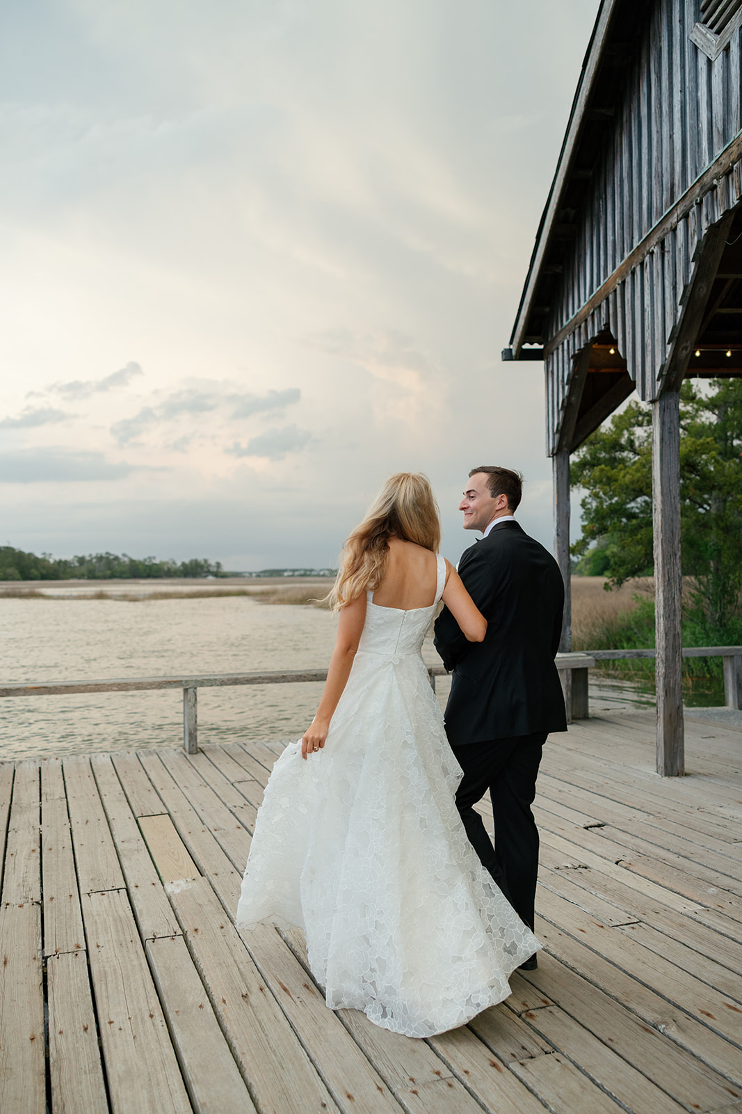Bride and groom on the dock in Charleston