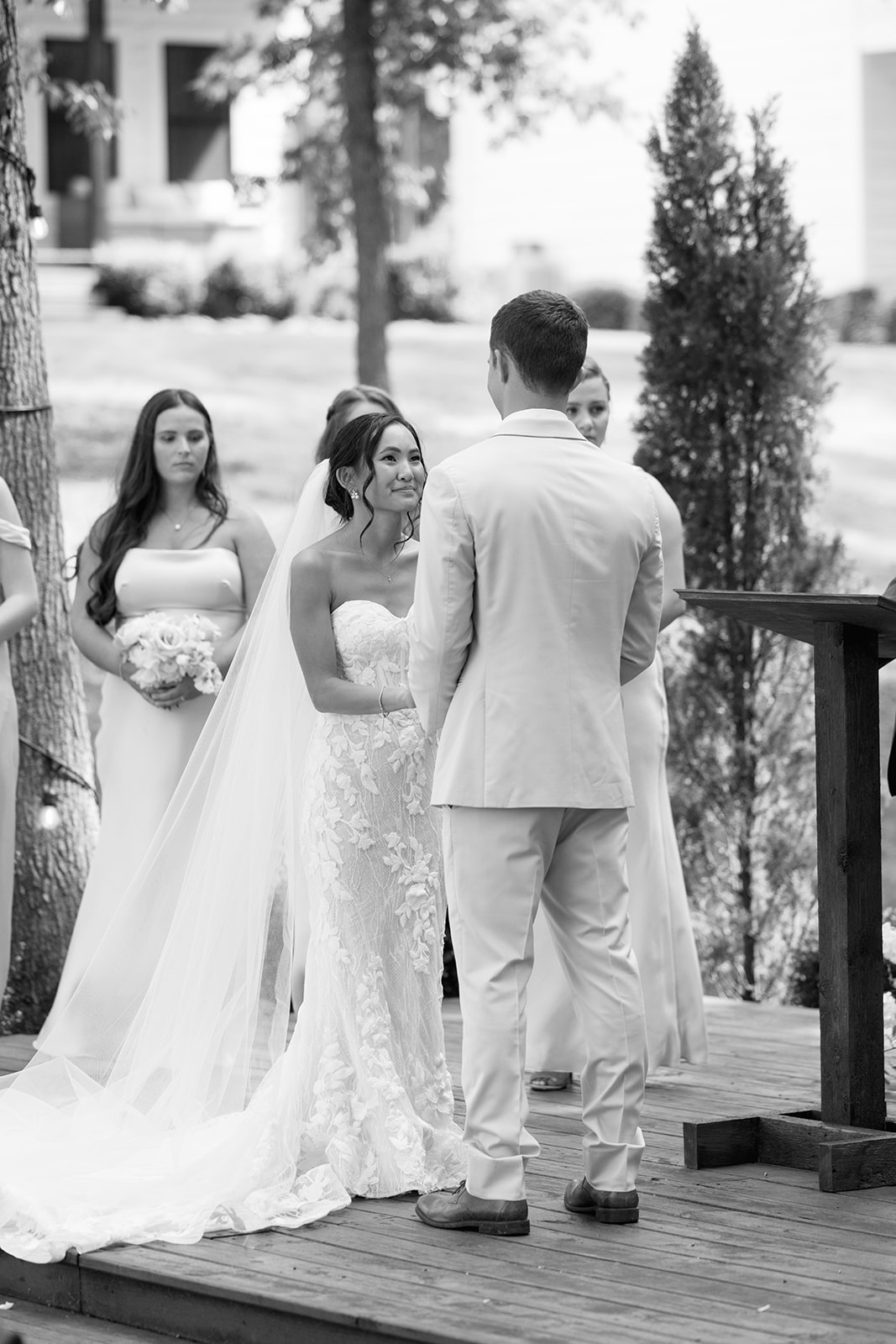 bride and groom smile at each other during their ceremony