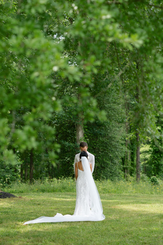 bride and groom during their first look at their South Carolina wedding