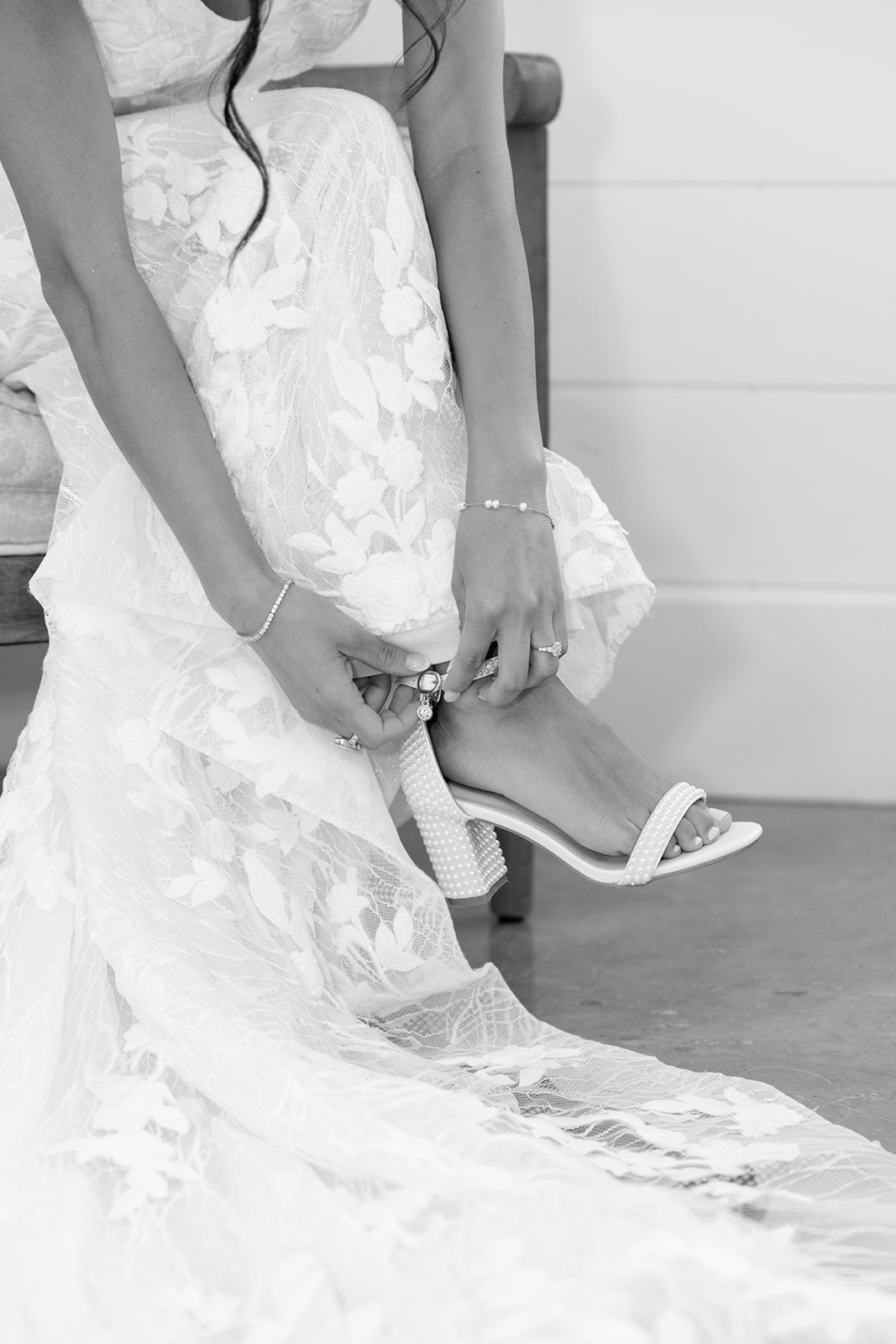 Bride puts on her heels as she prepares for her South Carolina Wedding
