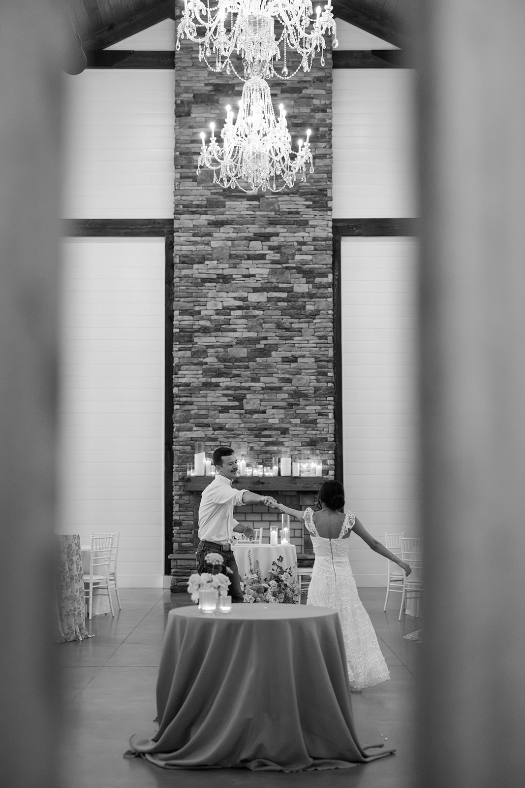 black and white wedding photo of the bride and groom sharing a private last dance at the end of their South Carolina Wedding reception