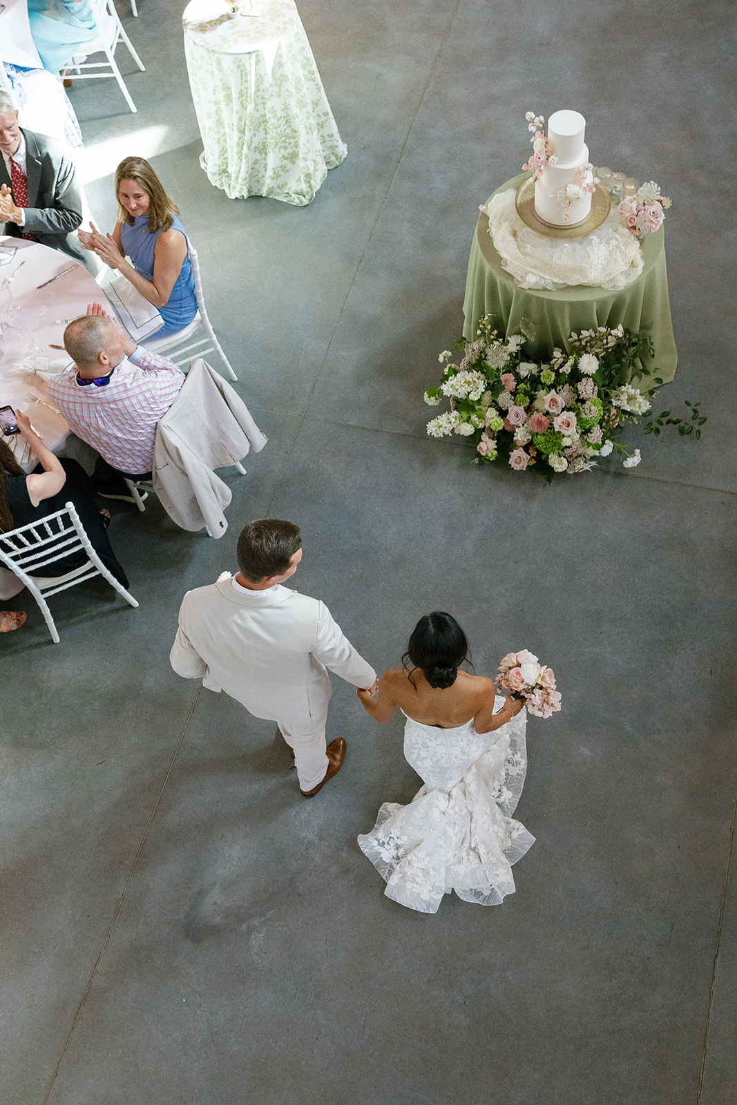 overhead shot of the newlyweds walking into their reception at their South Carolina wedding