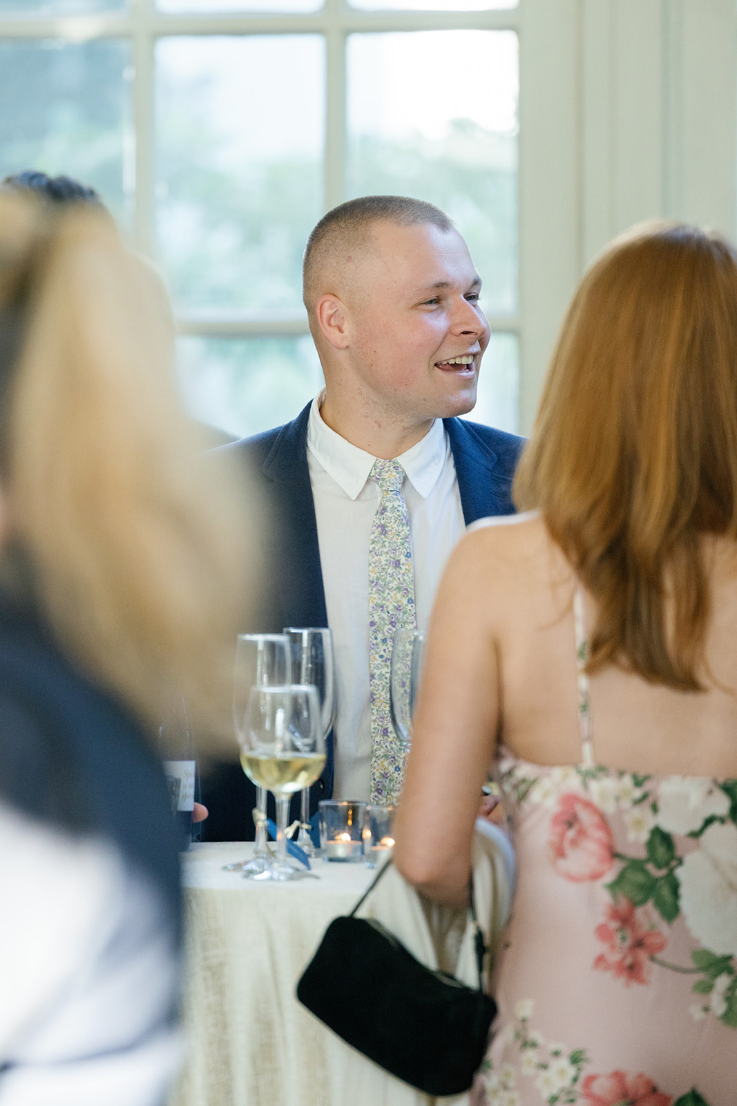 guests chatting during Bri and Henry’s rehearsal dinner at Duke Mansion in Charlotte, NC