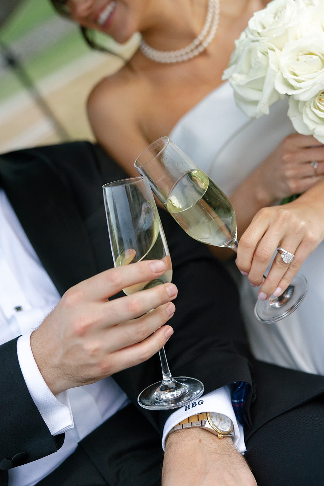 bride and groom toasting with champagne 