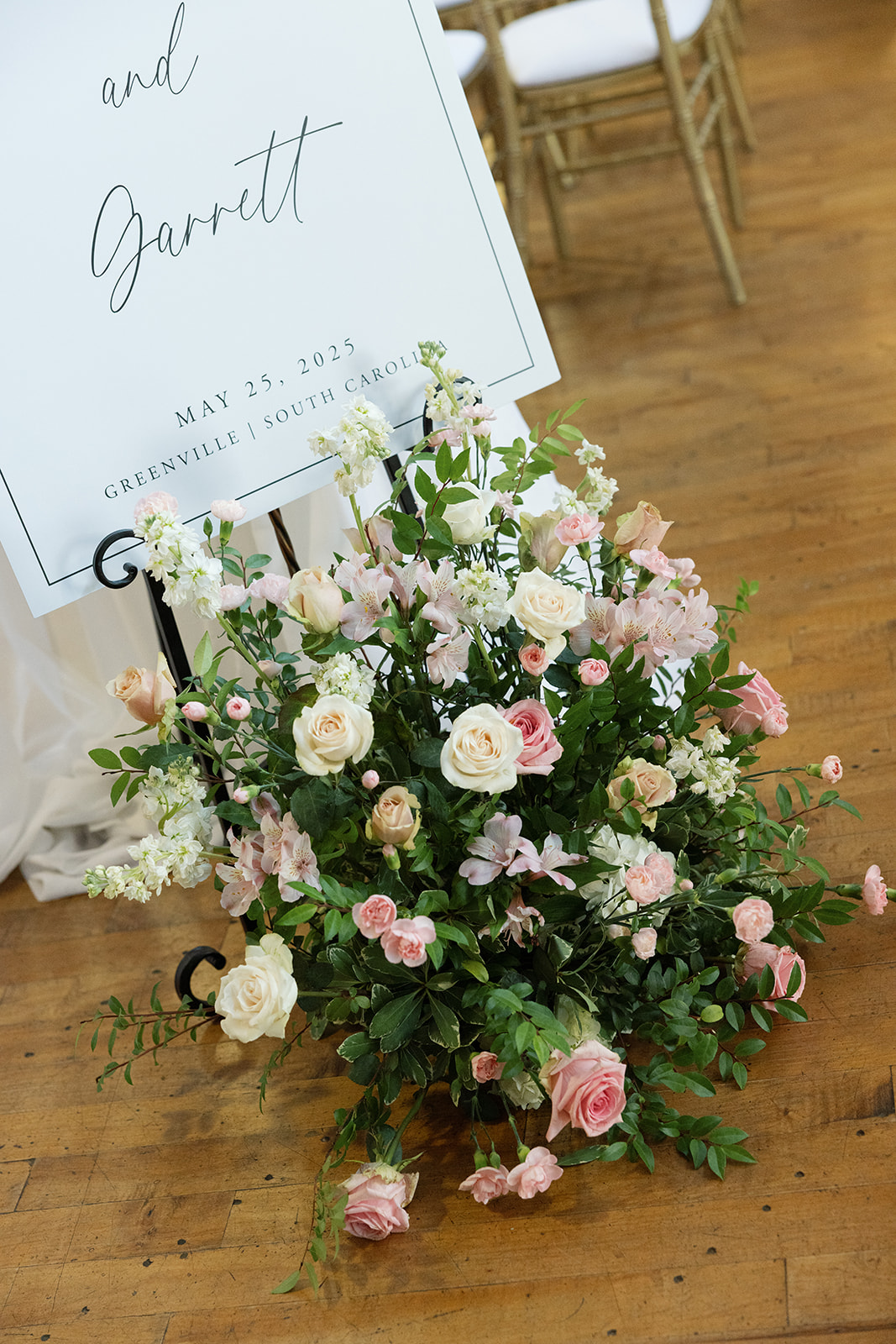 wedding signage and beautiful flowers at this Greenville SC wedding venue
