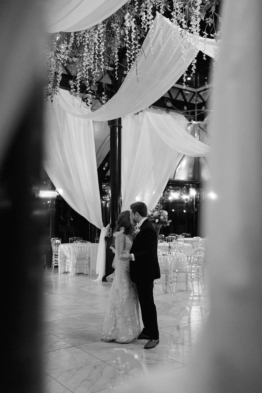 Bride and groom dancing together, candid wedding photography at Edinburgh West.