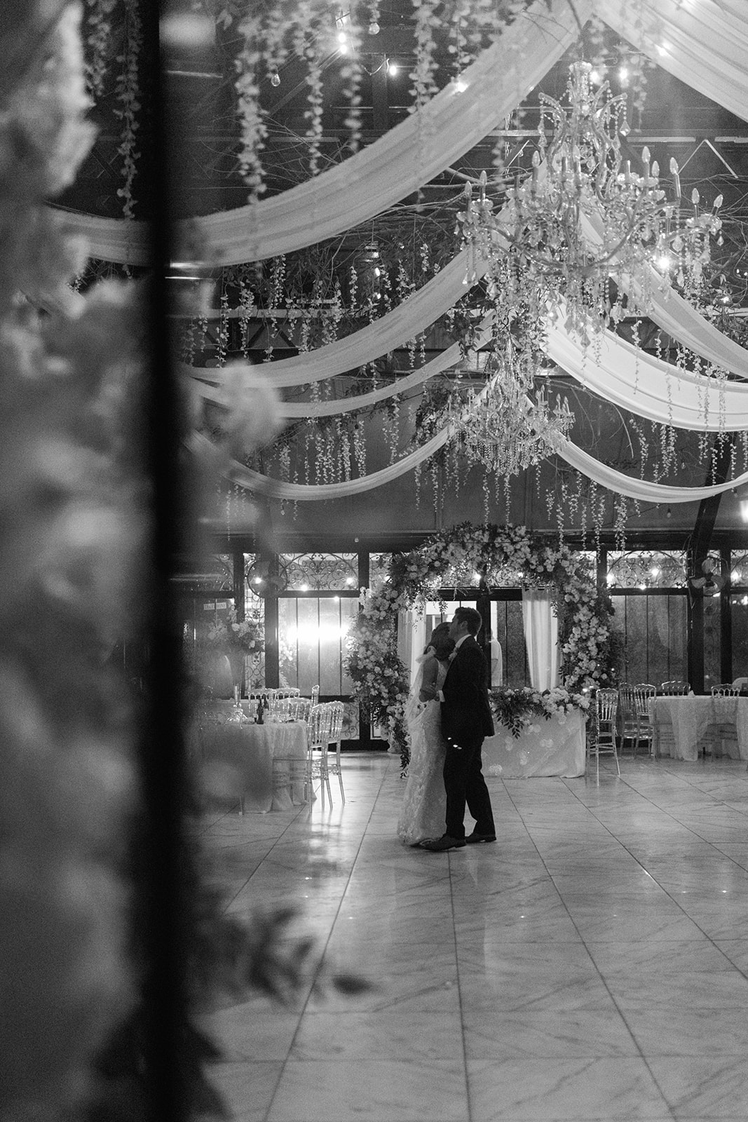 Bride and groom dancing together, candid wedding photography at Edinburgh West.