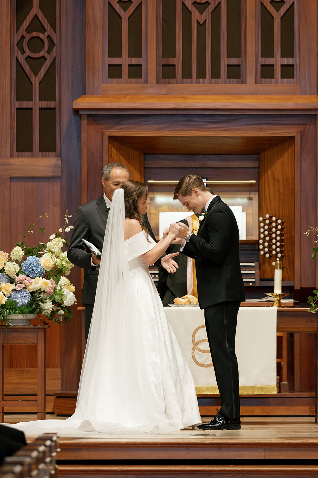Bride and groom exchange vows at Daniel Chapel at Furman University