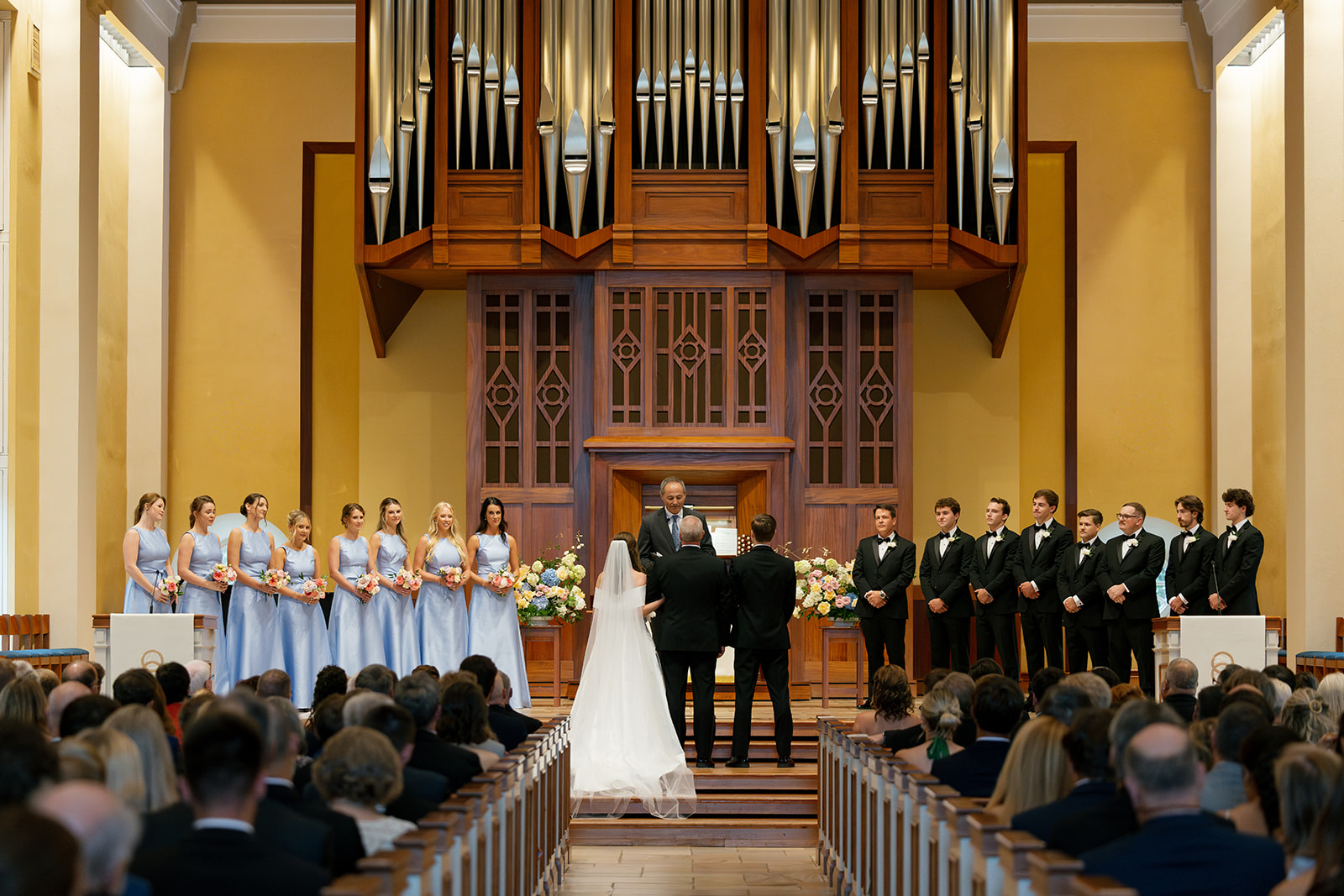 Bride and groom exchange vows at Daniel Chapel at Furman University