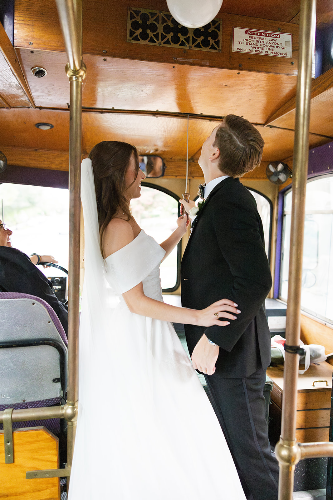 Bride and groom on trolley 