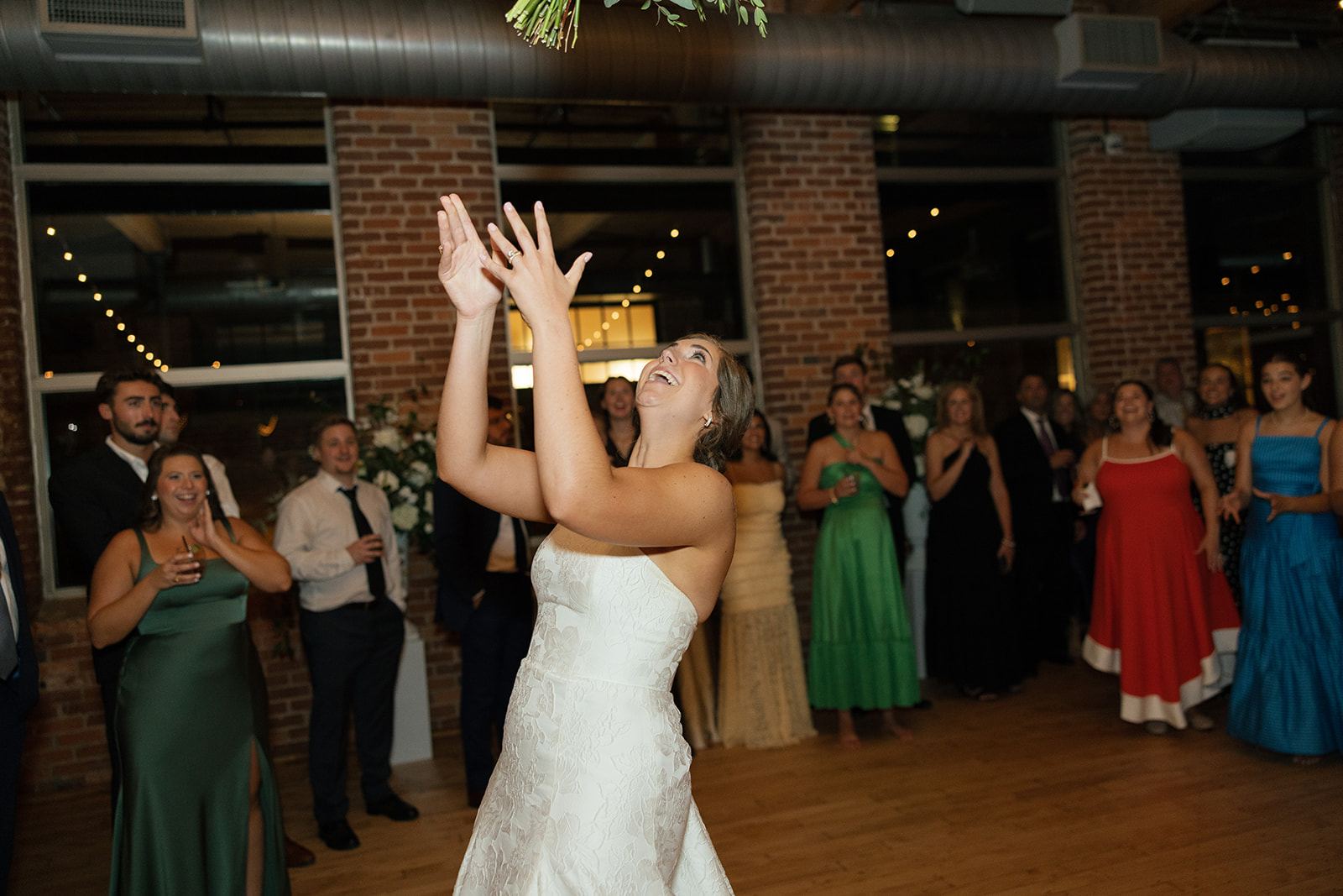 the bride throwing her bouquet 