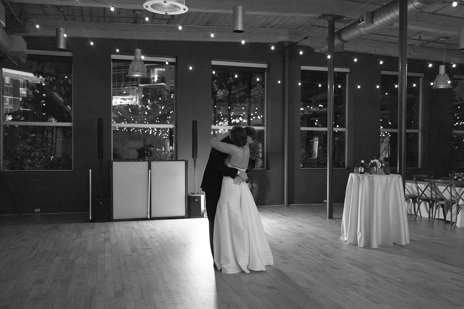 the bride and groom dancing during their last dance