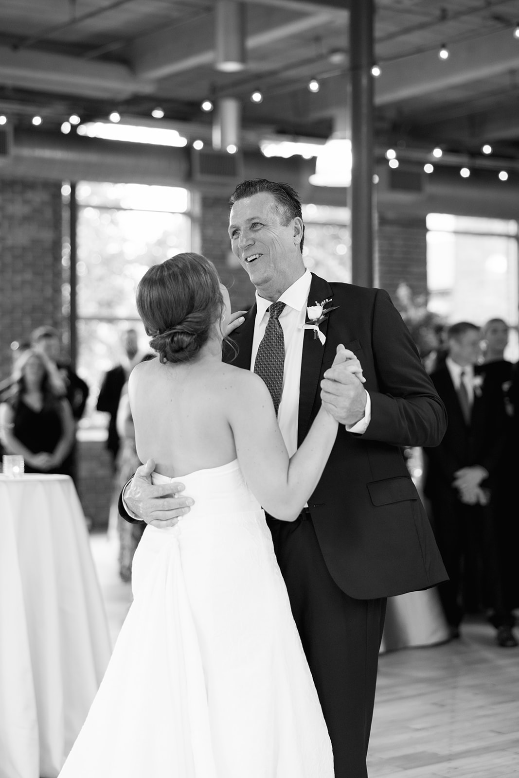 the bride dancing with her dad during the Greenville Wedding reception
